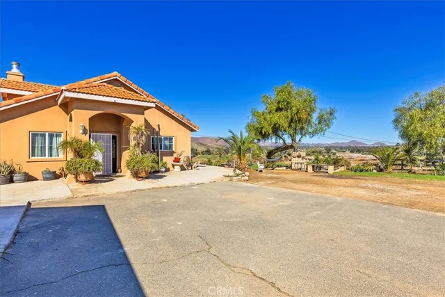 a view of a house with a patio