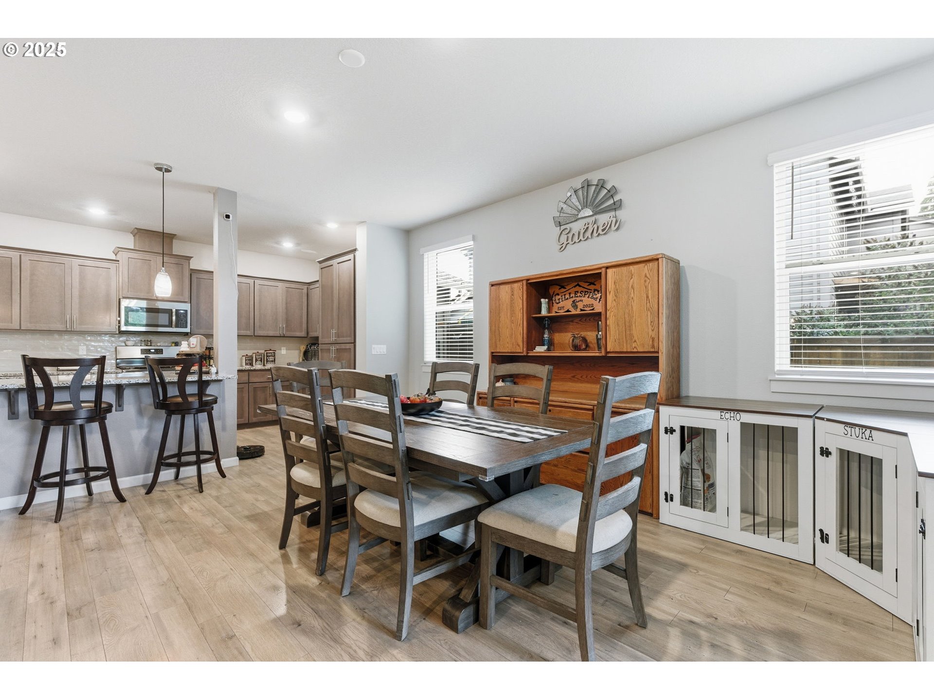 476 Southwest 15th Avenue Canby, OR 97013 - Photo 13 of 43 a dining room with furniture and wooden floor