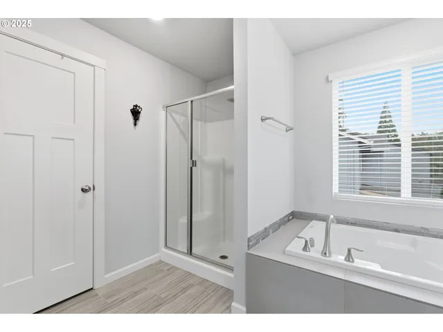 a work room with furniture and a window