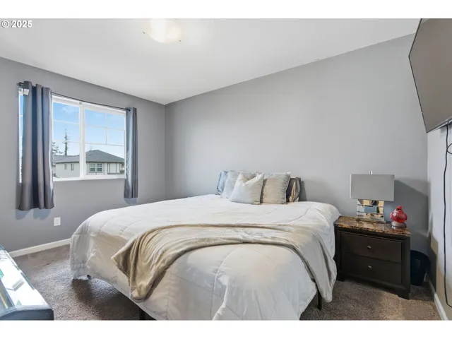 a bedroom with furniture toys and a baby crib