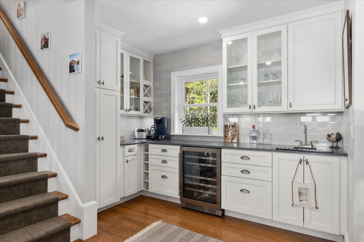 31 Amy Brown Road Mashpee, MA 02649 - Photo 22 of 95 a kitchen with granite countertop a stove a sink and a cabinets