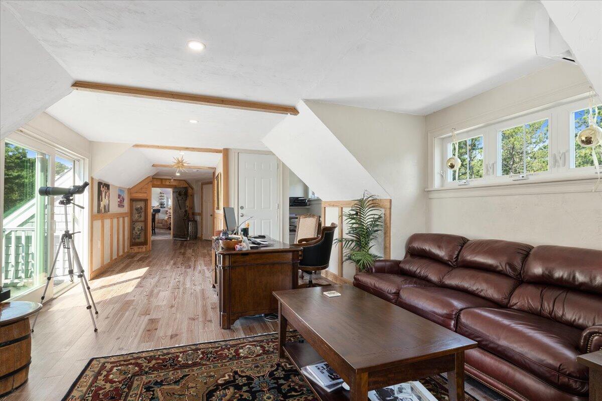 31 Amy Brown Road Mashpee, MA 02649 - Photo 55 of 95 a living room with furniture and a couch