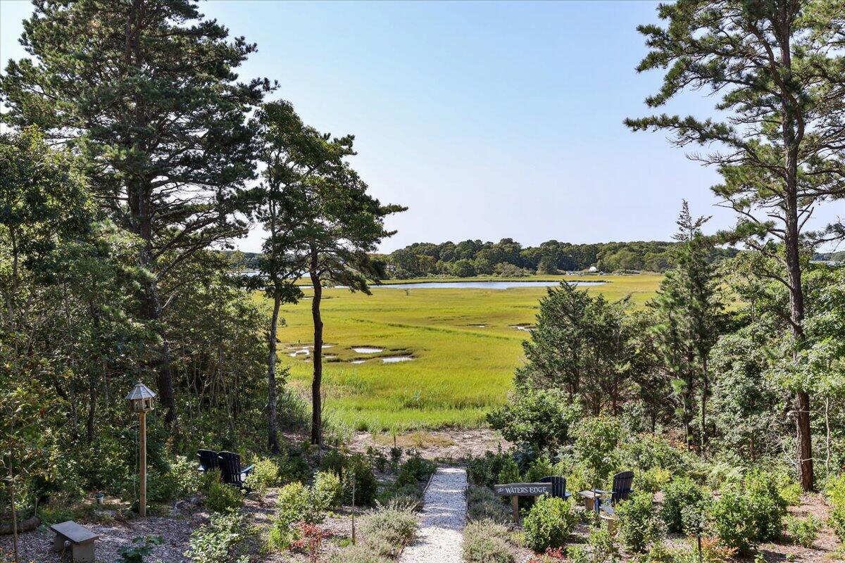 31 Amy Brown Road Mashpee, MA 02649 - Photo 67 of 95 a view of a lake with a big yard
