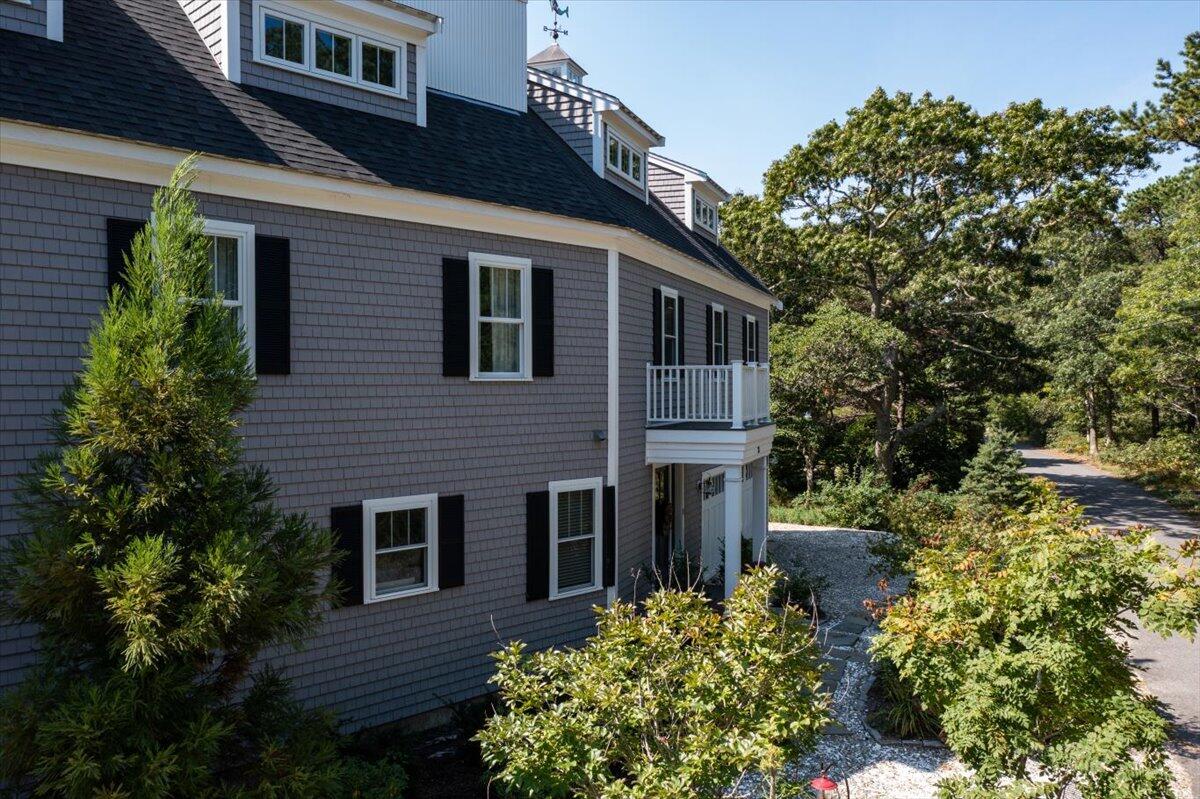 31 Amy Brown Road Mashpee, MA 02649 - Photo 72 of 95 a front view of a house with a yard