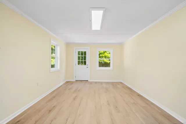 an empty room with windows