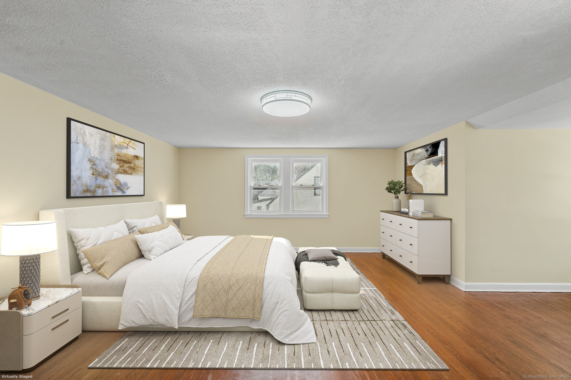 20 Rosina Road Hamden, CT 06514 - Photo 22 of 40 a bedroom with a bed and painting on the wall