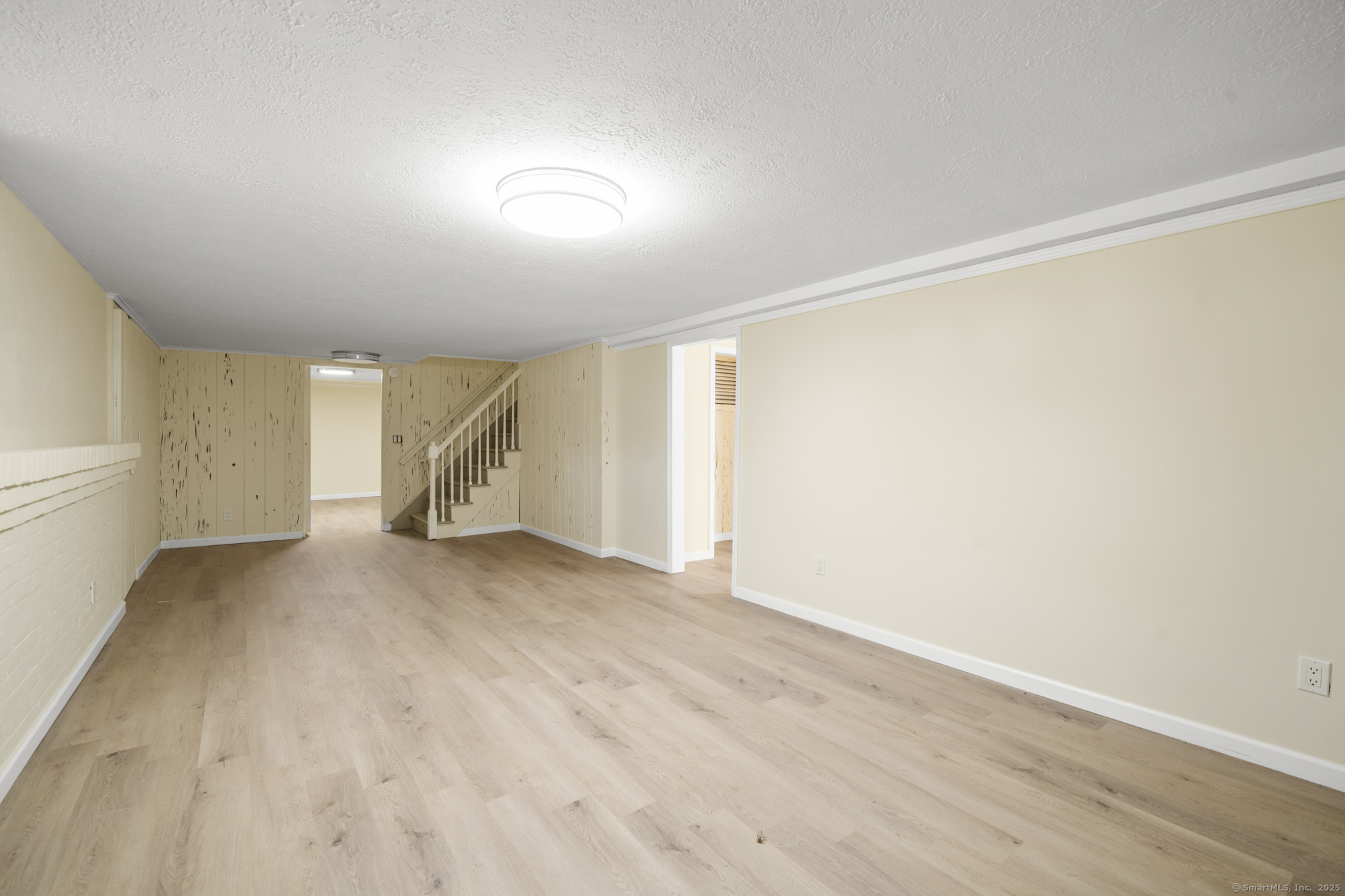 20 Rosina Road Hamden, CT 06514 - Photo 33 of 40 a view of an empty room with wooden floor and a window