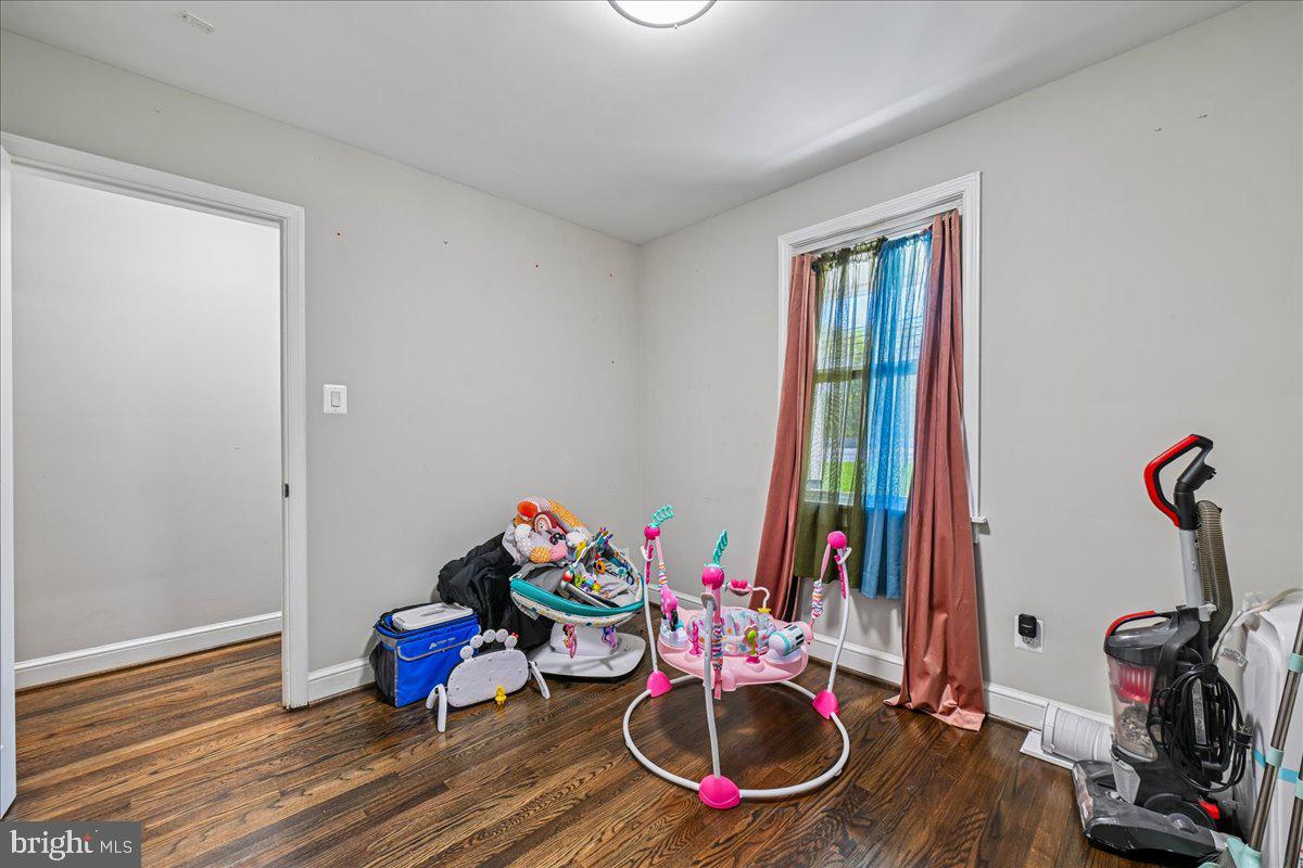 14621 Livingston Road Accokeek, MD 20607 - Photo 20 of 35 a room with furniture and wooden floor
