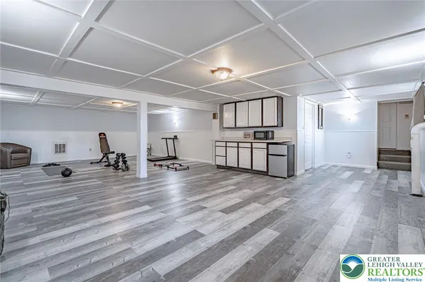 a view of a room with gym equipment