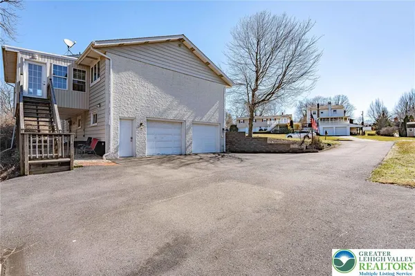 a view of the street with a building in the background