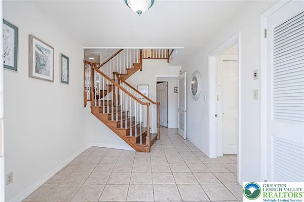 a view of an entryway with stairs