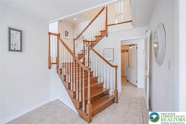 a view of a hallway with staircase