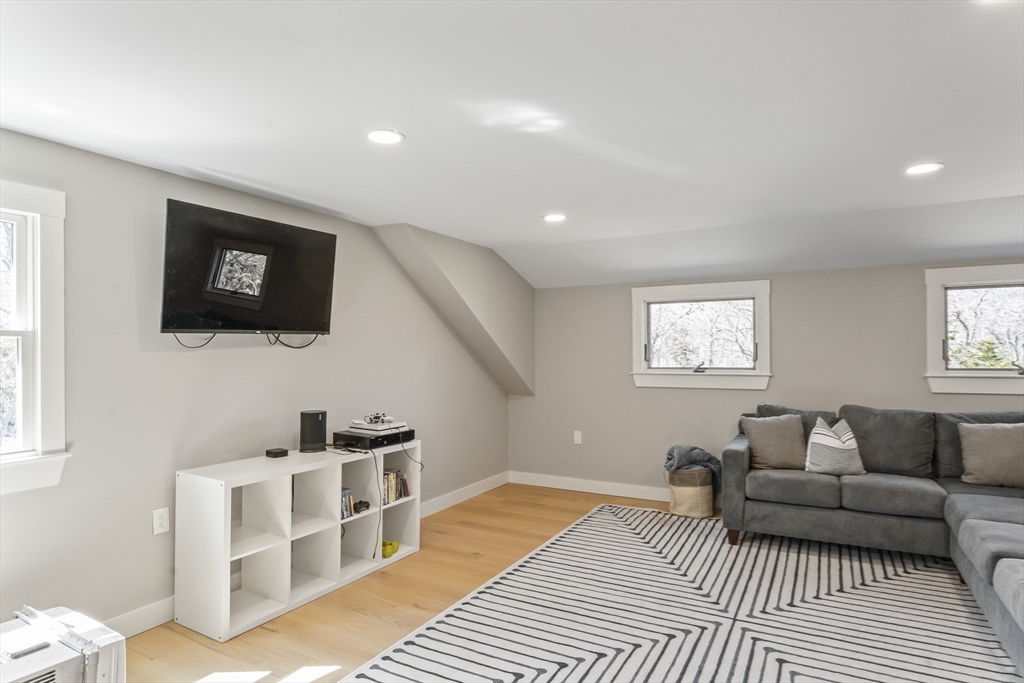7 Pip'n Road Edgartown, MA 02539 - Photo 34 of 41 a living room with furniture and a flat screen tv