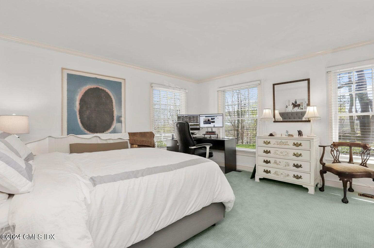 1 Old Church Road, Unit 1 Greenwich, CT 06830 - Photo 11 of 17 a bedroom with a bed and a dresser