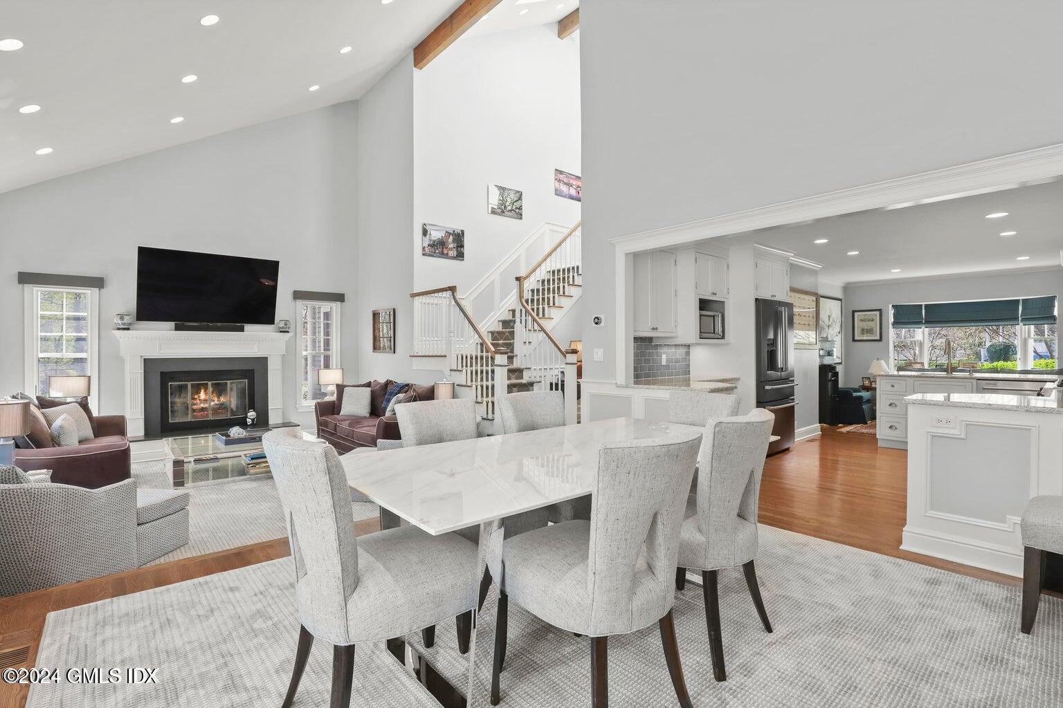 1 Old Church Road, Unit 1 Greenwich, CT 06830 - Photo 4 of 17 a view of a dining room with furniture window and wooden floor