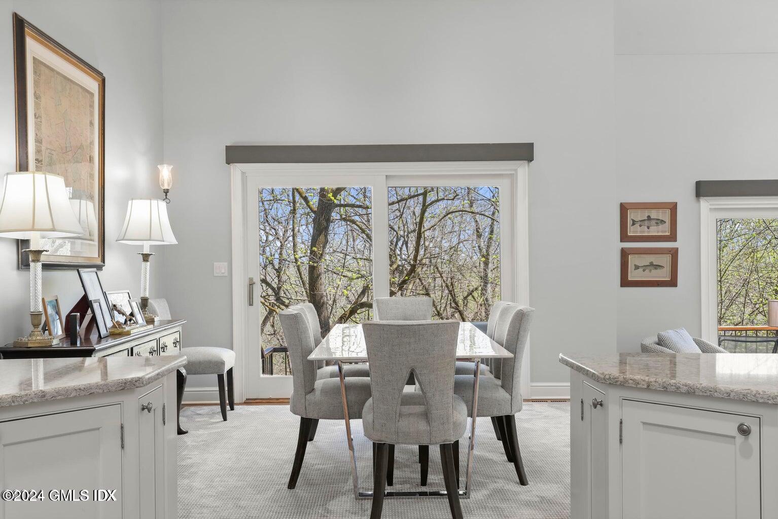 1 Old Church Road, Unit 1 Greenwich, CT 06830 - Photo 5 of 17 a view of a dining room with furniture and window
