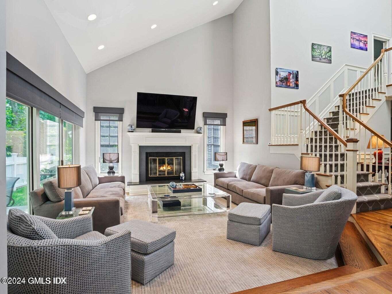 1 Old Church Road, Unit 1 Greenwich, CT 06830 - Photo 6 of 17 a living room with furniture fireplace and a flat screen tv