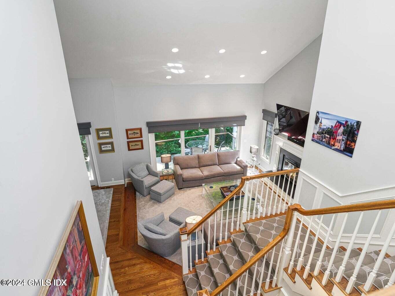 1 Old Church Road, Unit 1 Greenwich, CT 06830 - Photo 7 of 17 a living room with furniture and a flat screen tv