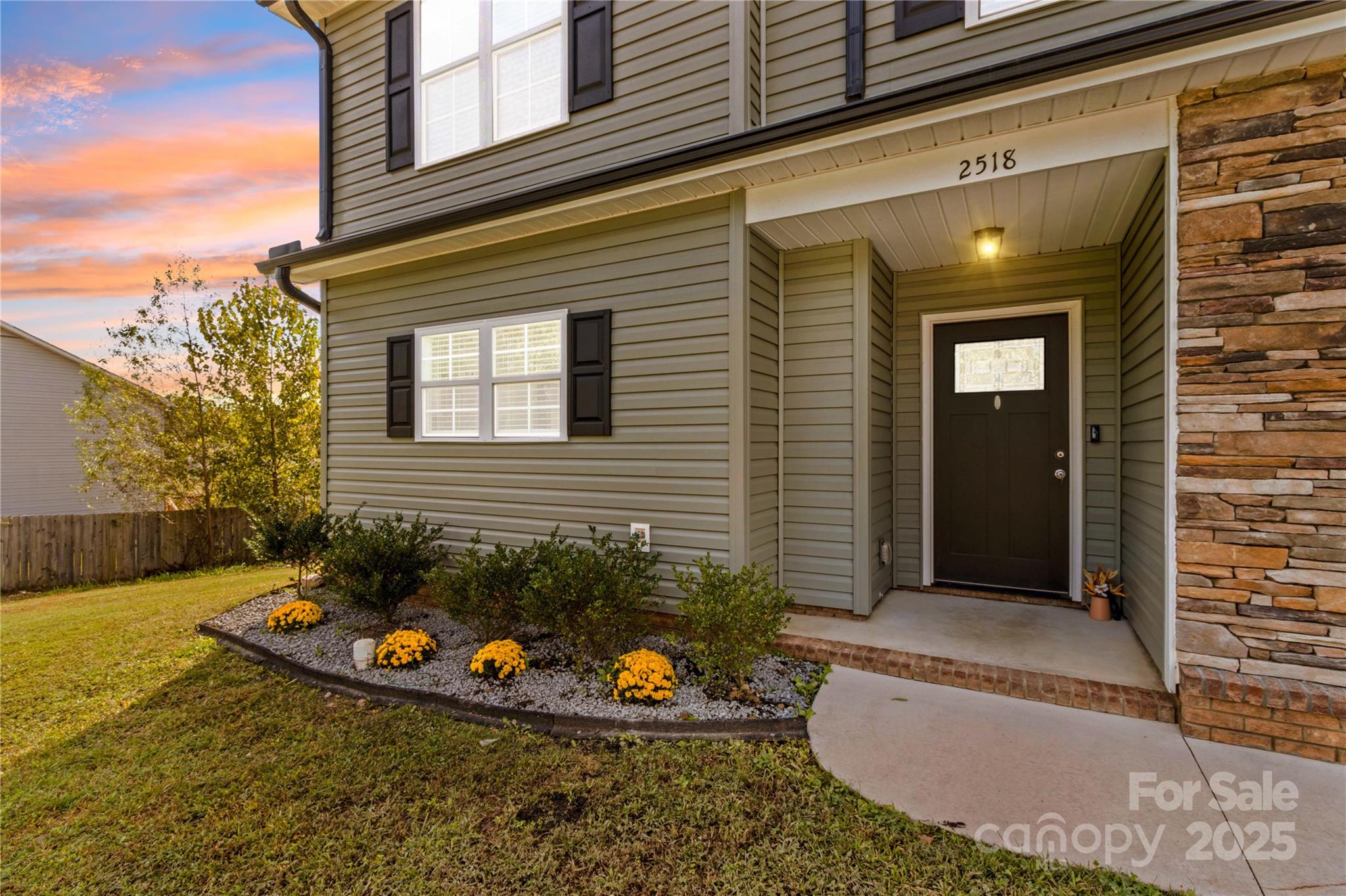2518 Moose Road Kannapolis, NC 28083 - Photo 2 of 47 a view of a house with a small yard and sitting area