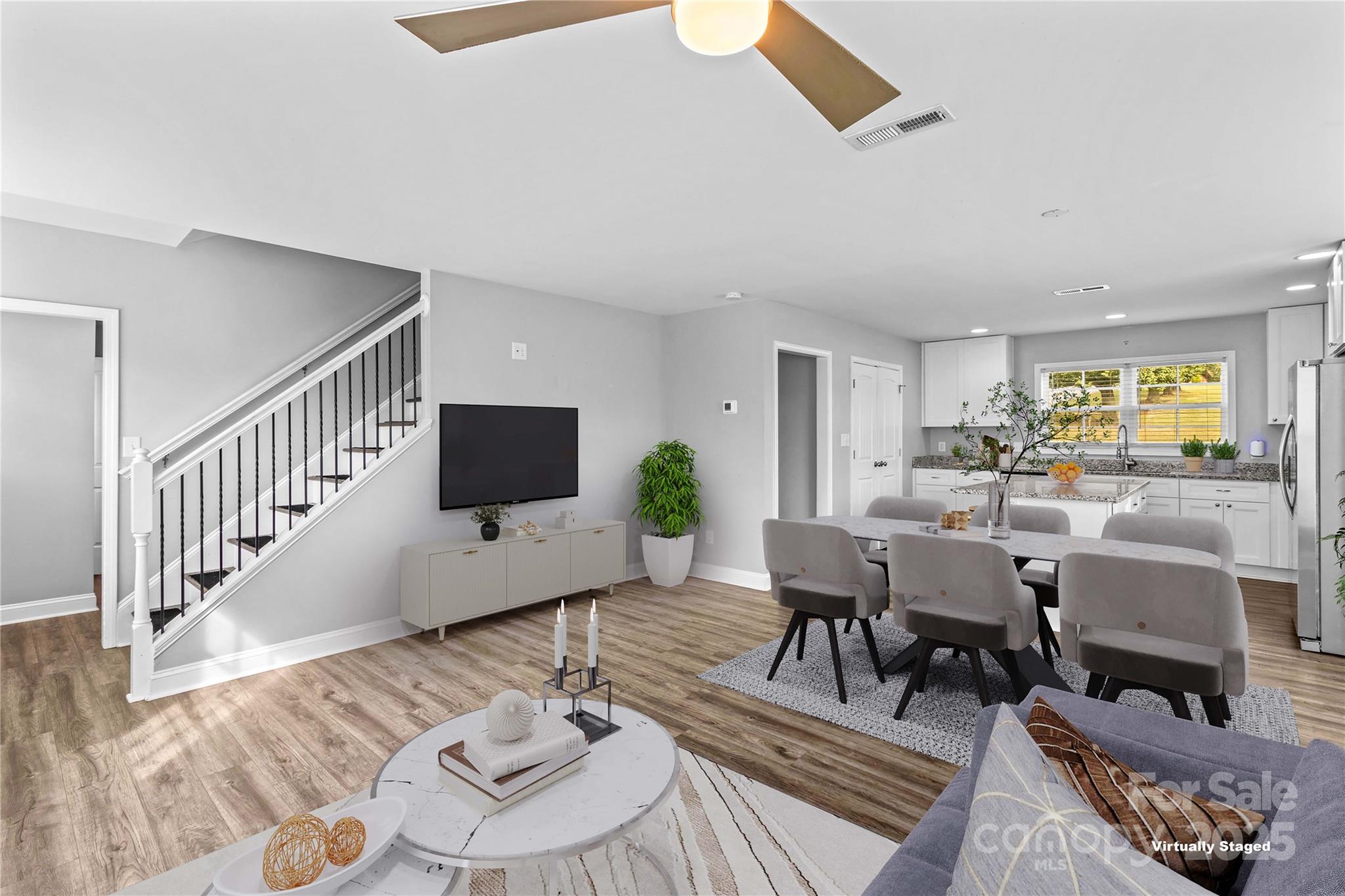 2518 Moose Road Kannapolis, NC 28083 - Photo 8 of 47 a living room with lots of furniture and a view of kitchen