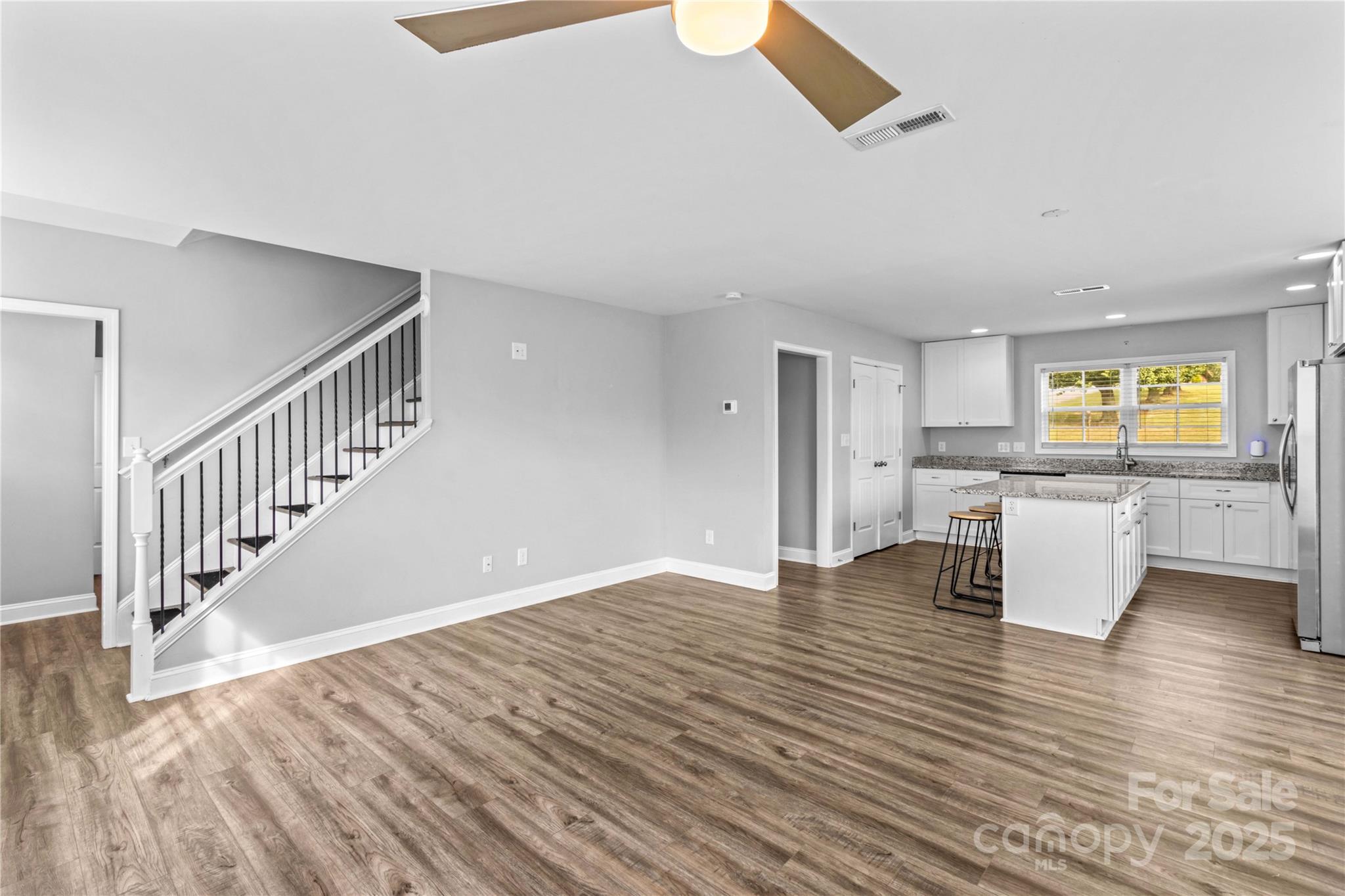 2518 Moose Road Kannapolis, NC 28083 - Photo 9 of 47 a view of a kitchen with wooden floor and windows