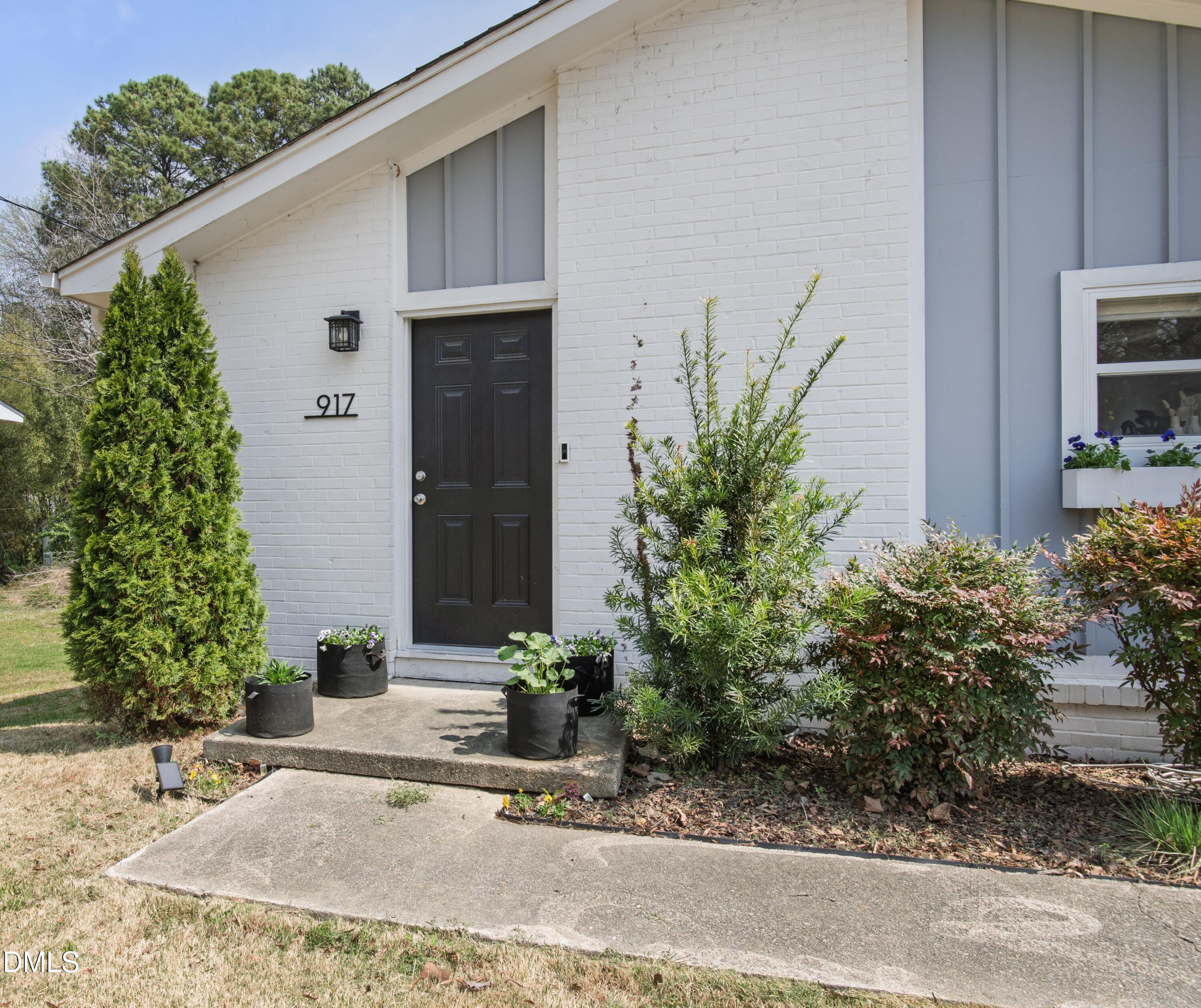 917 Carlisle Street Raleigh, NC 27610 - Photo 1 of 33 a view of a entryway front of house