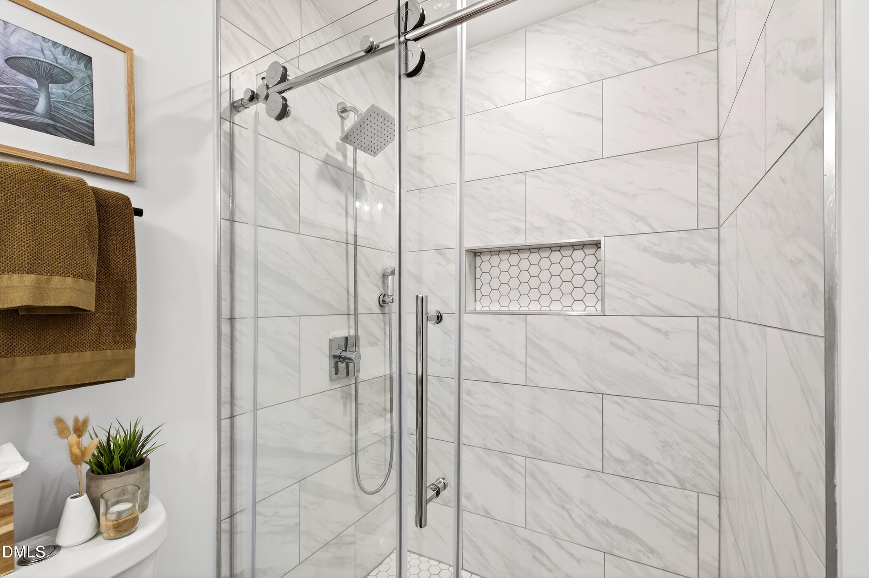 917 Carlisle Street Raleigh, NC 27610 - Photo 25 of 33 a bathroom with a shower