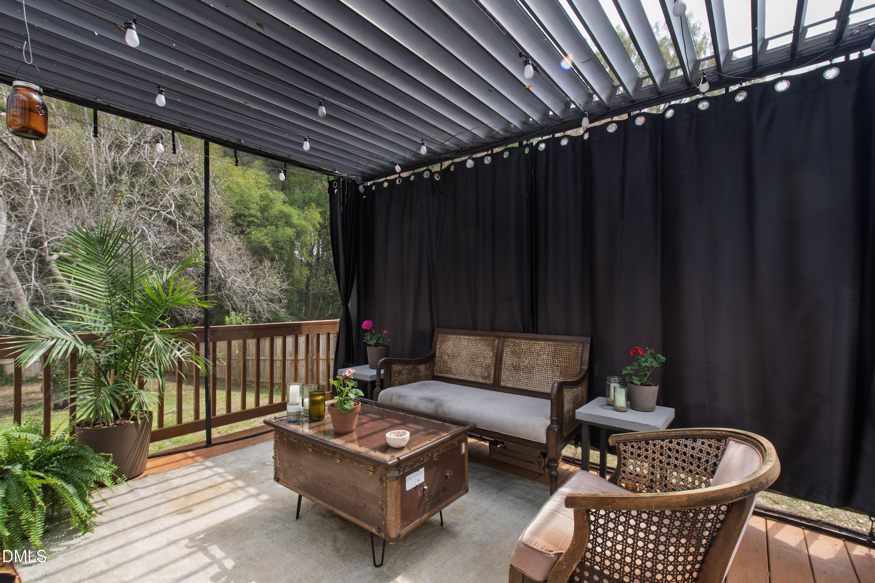 917 Carlisle Street Raleigh, NC 27610 - Photo 27 of 33 a outdoor living space with furniture and a potted plant