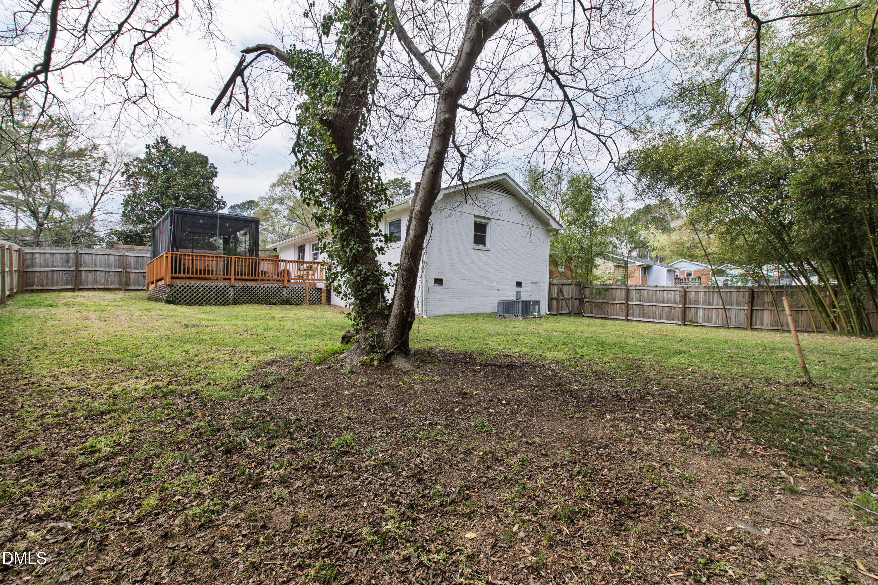 917 Carlisle Street Raleigh, NC 27610 - Photo 29 of 33 a view of a house with a yard