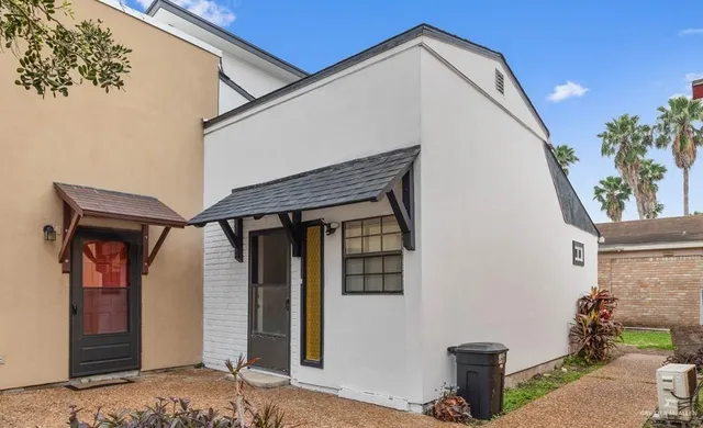 a front view of a house with garage