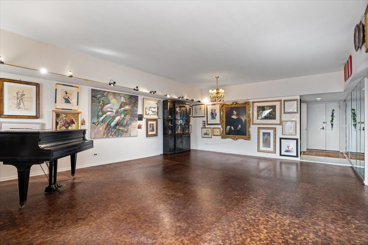 175 East Delaware Place, Unit 7008 Chicago, IL 60611 - Photo 8 of 28 a view of an empty room with window and workspace