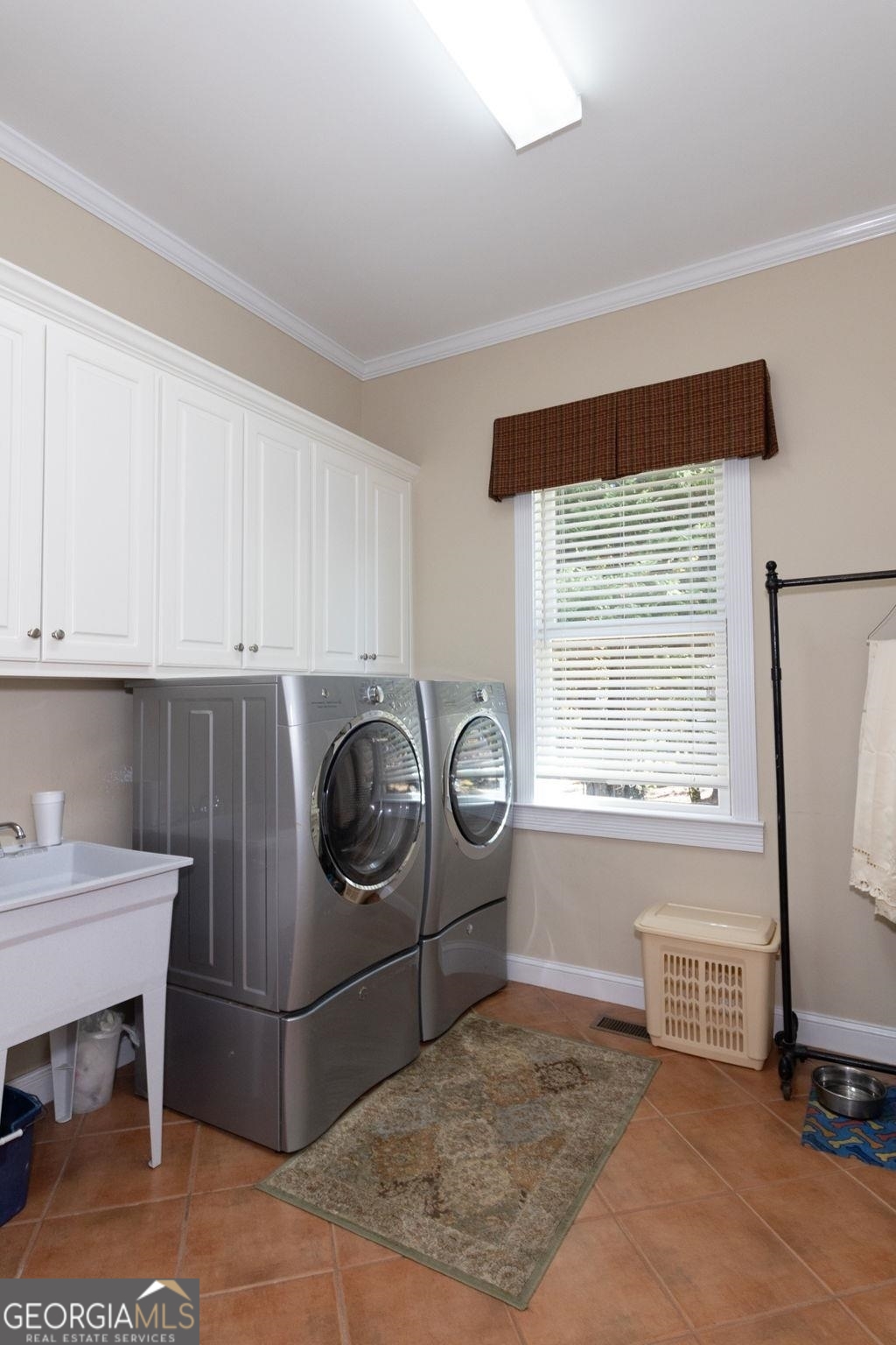 551 Mountain Ridge Drive Manchester, GA 31816 - Photo 23 of 72 Very spacious laundry room with sink.
