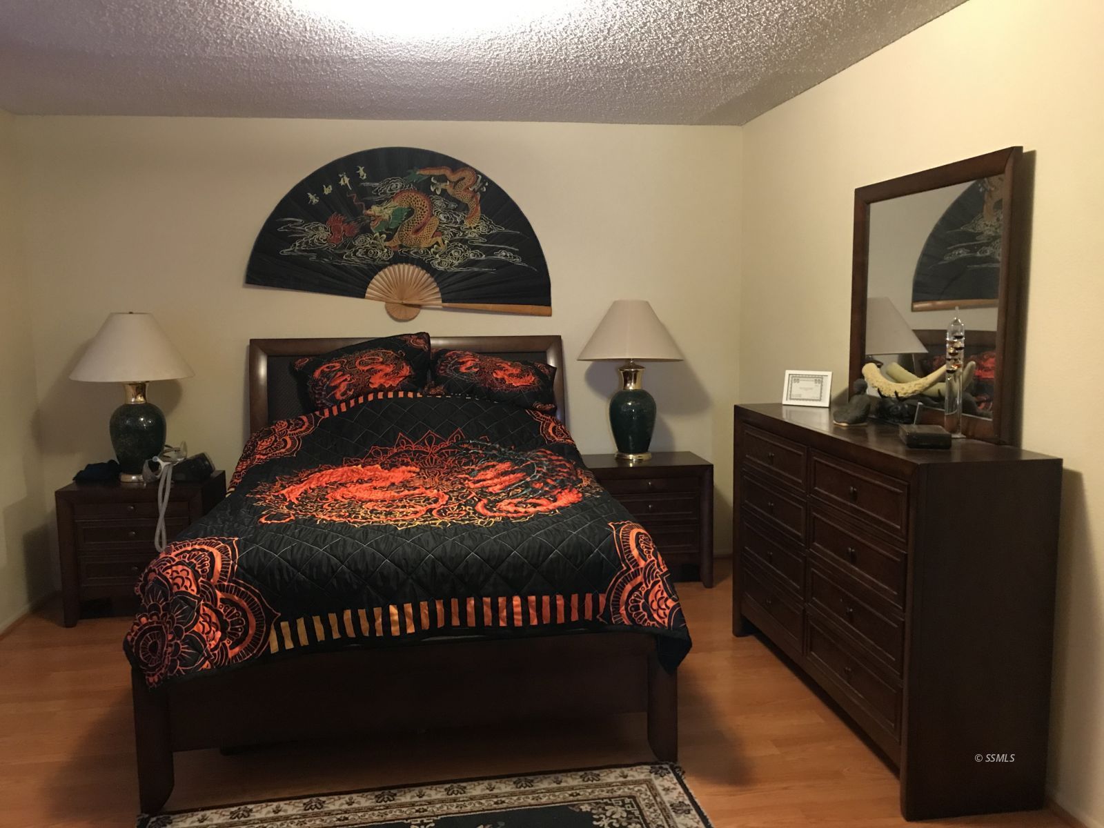 232 Apache Lane Ridgecrest, CA 93555 - Photo 12 of 19 a bed sitting in a bedroom next to a window