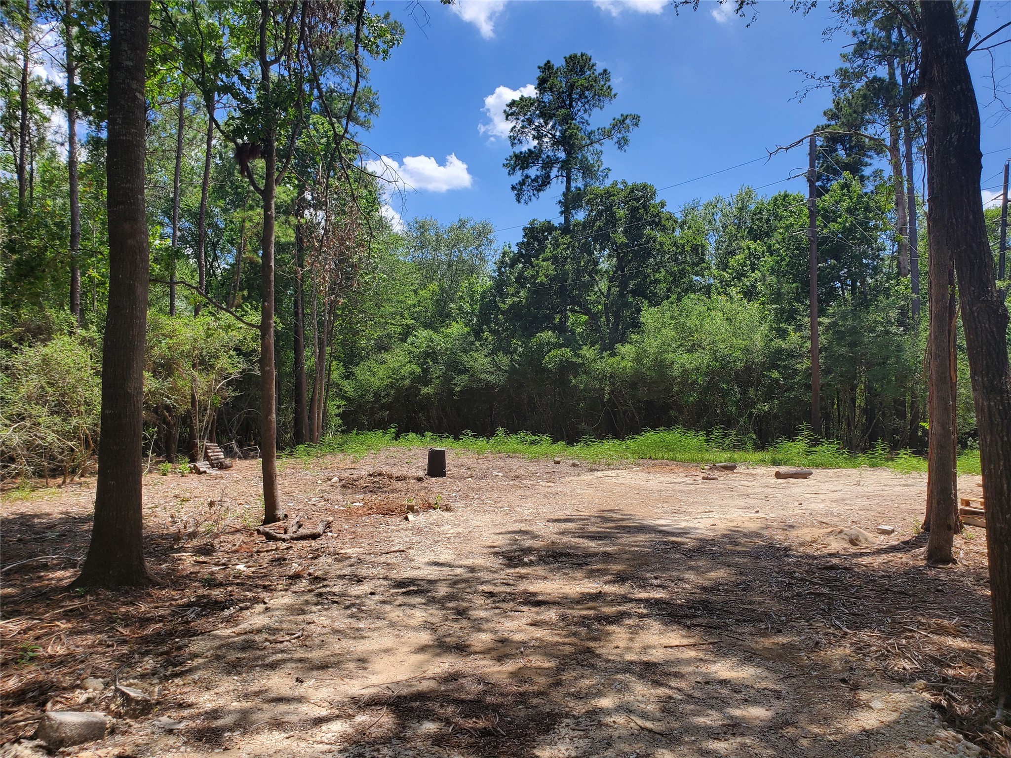 0 Cayman Way Humble, TX 77338 - Photo 5 of 9 a view of a road with a yard