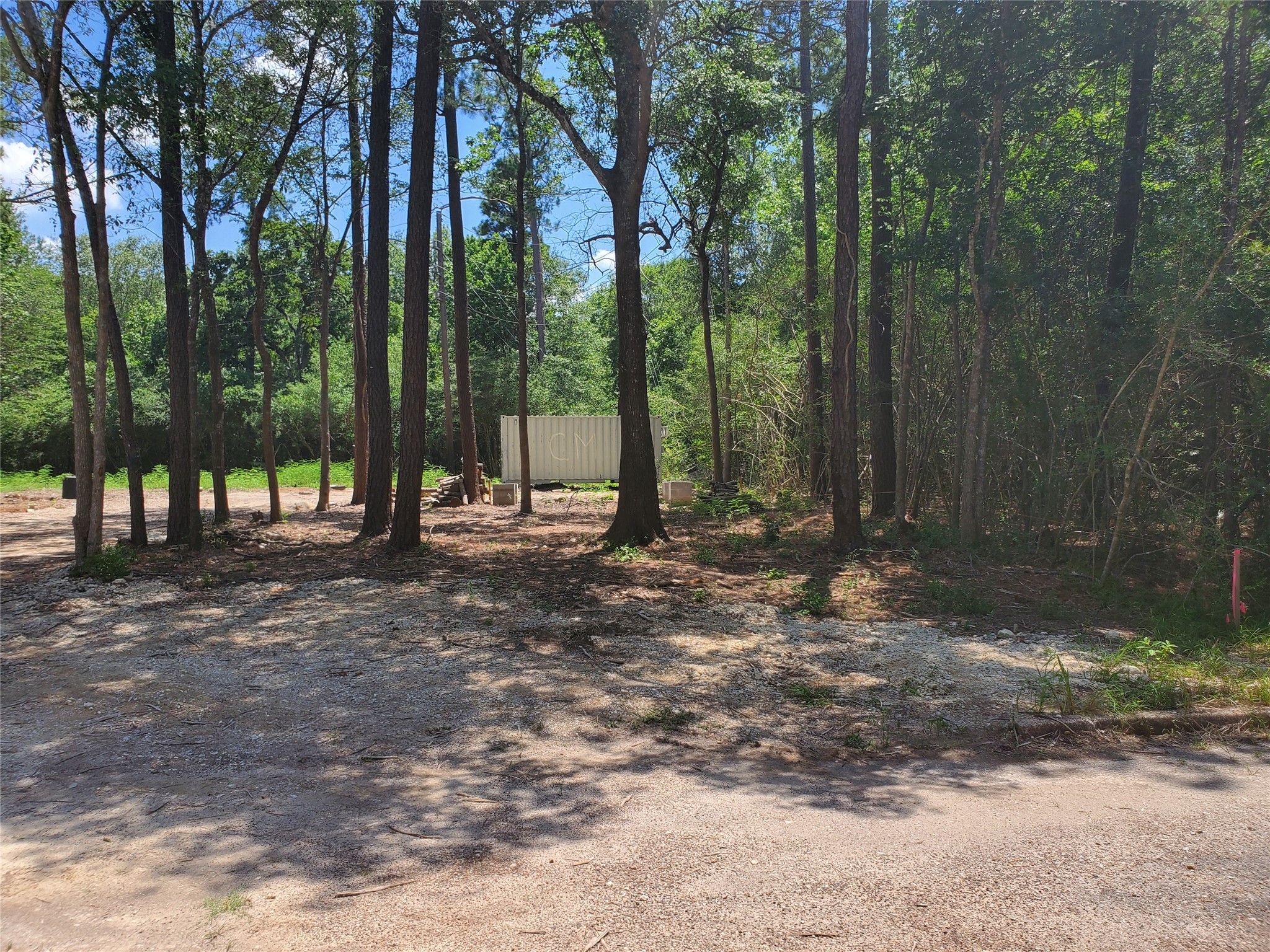 0 Cayman Way Humble, TX 77338 - Photo 7 of 9 a view of outdoor space with lots of trees