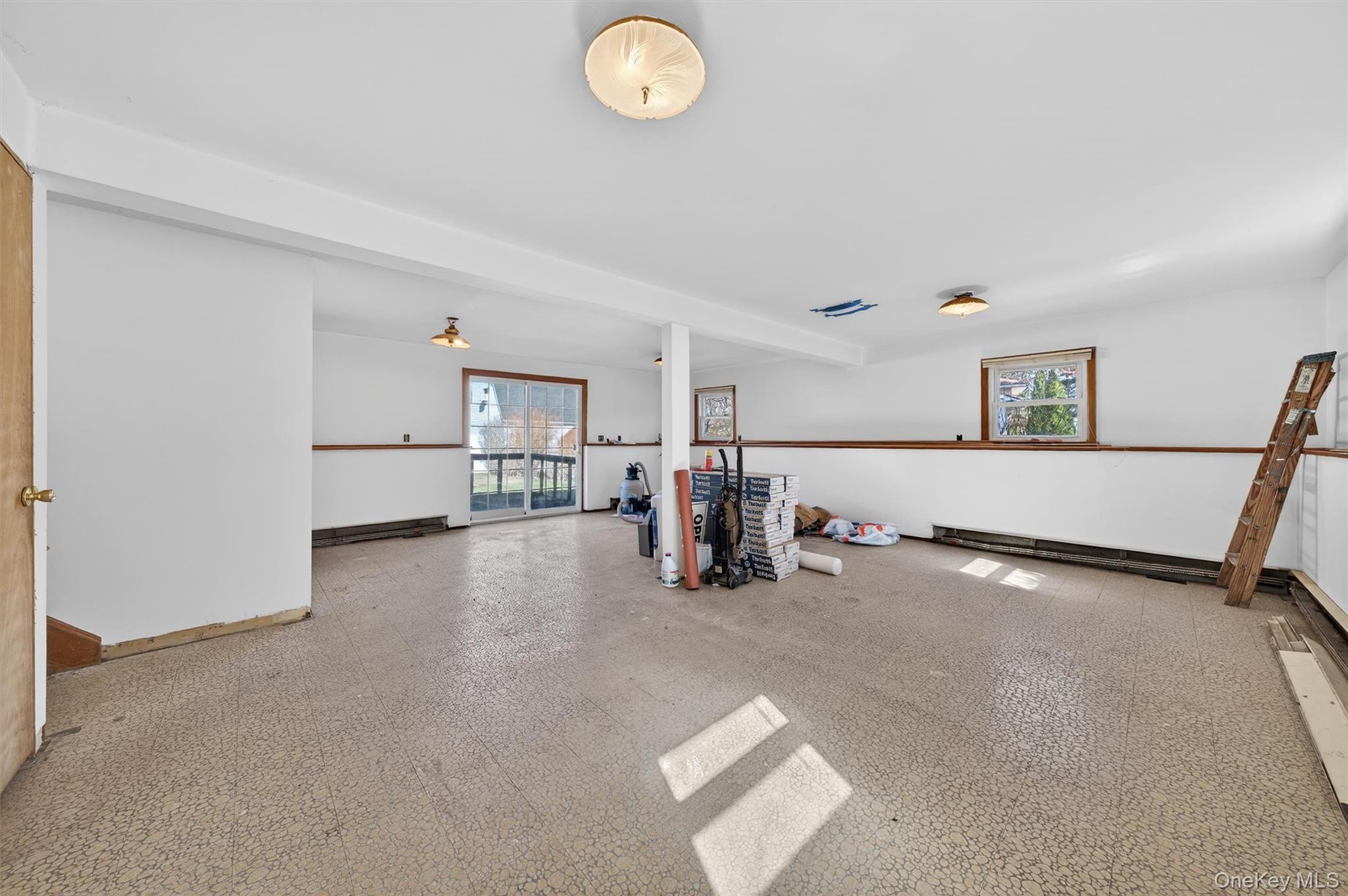 5 Loch Invar Lane Middletown, NY 10941 - Photo 28 of 47 With sliders to outside; full bath and access to basement & garage.