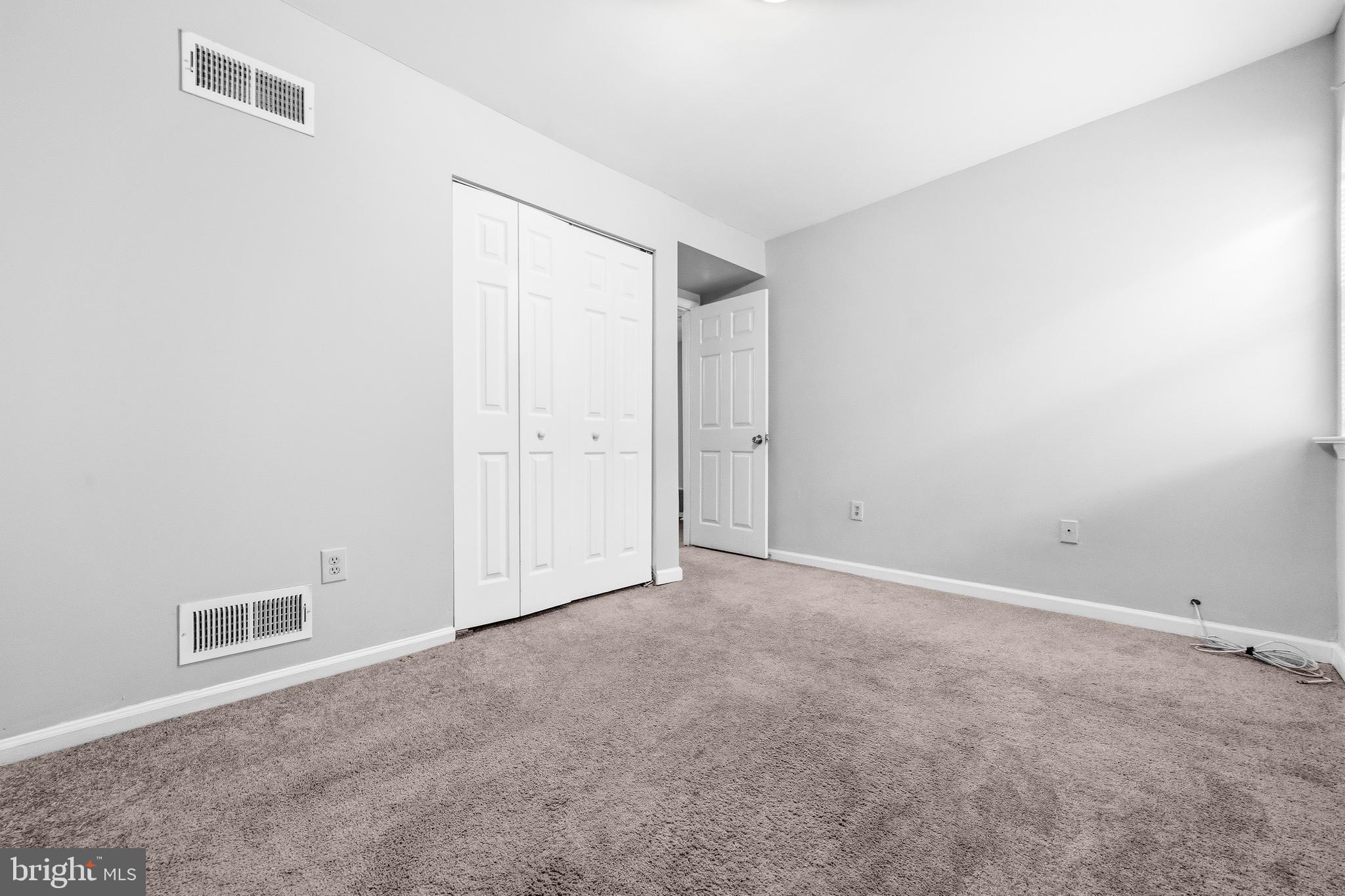 1983 Addison Road South District Heights, MD 20747 - Photo 20 of 32 an empty room with windows