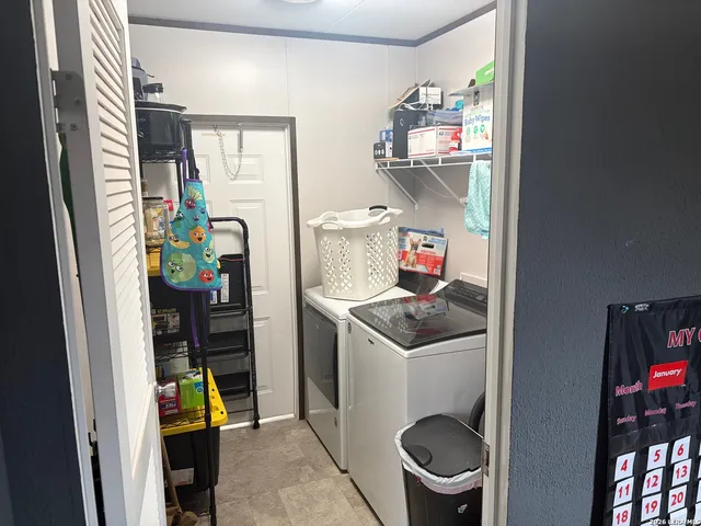 a room with a washer and dryer