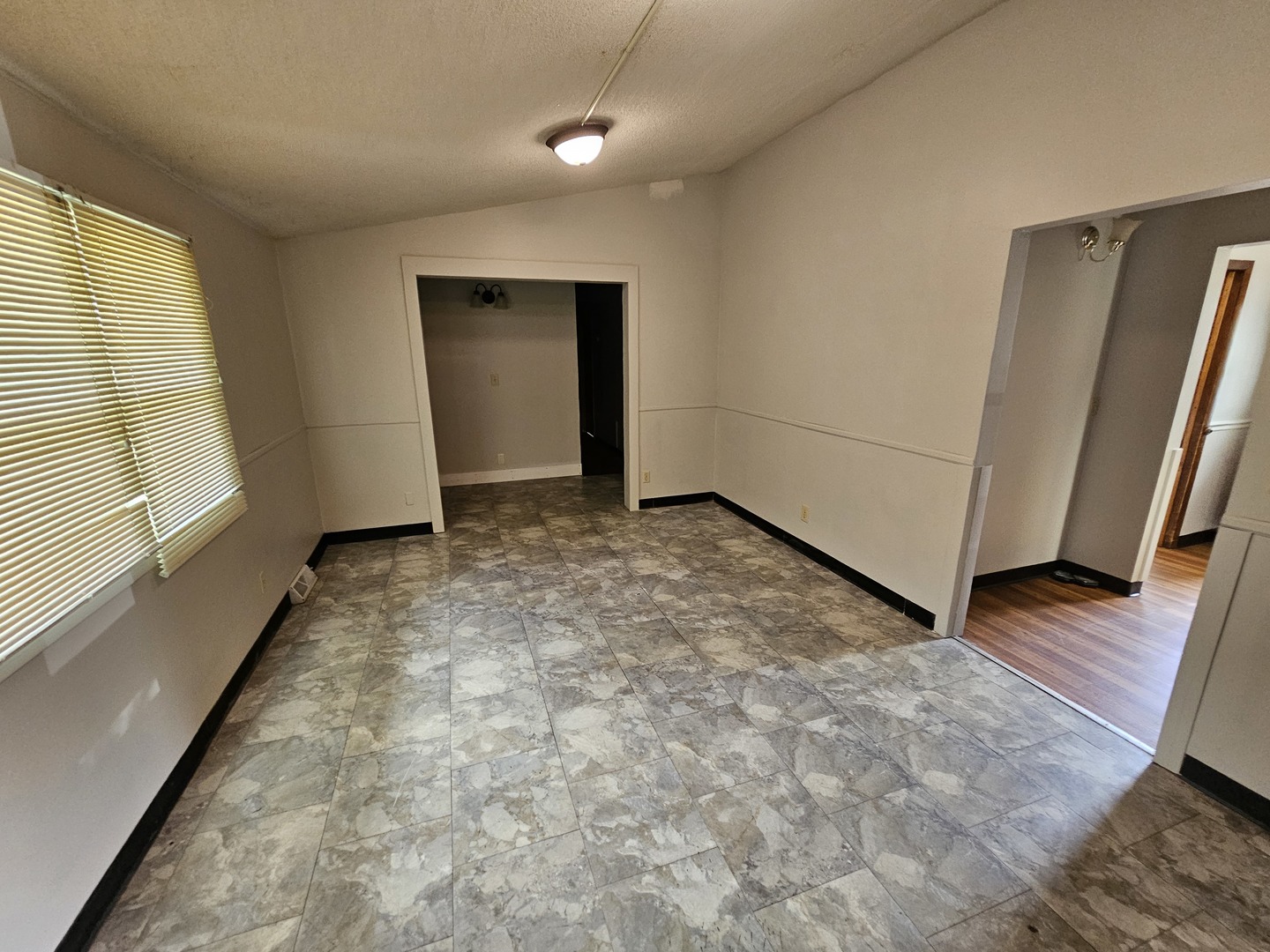 2875 North Vine Street Decatur, IL 62526 - Photo 10 of 19 a view of an empty room and a window