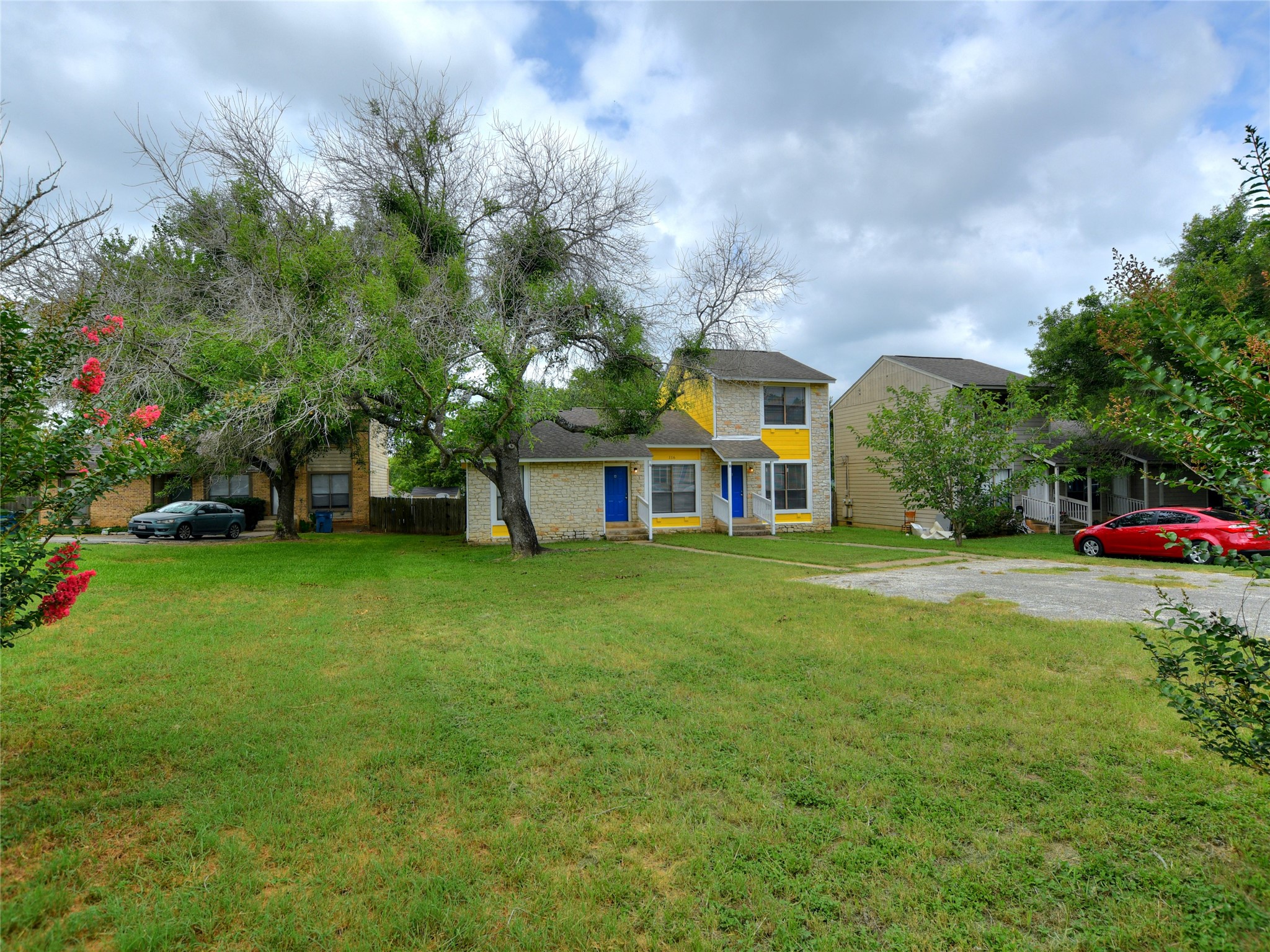 116 Hillside Drive, Unit B Elgin, TX 78621 - Photo 1 of 1 View of front of home featuring a front lawn and brick siding