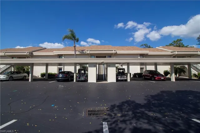 a view of a large building with a street