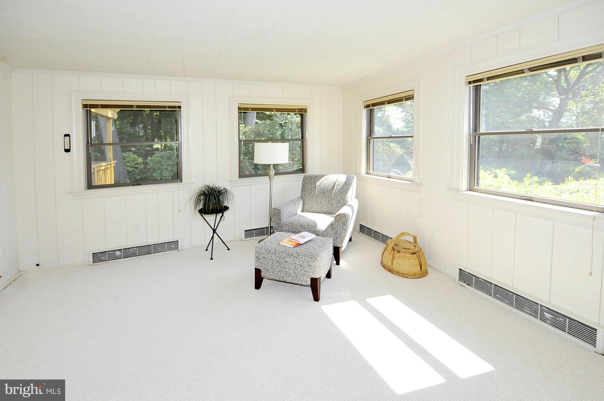 5609 Ridgefield Road Bethesda, MD 20816 - Photo 8 of 15 a living room with furniture and a window