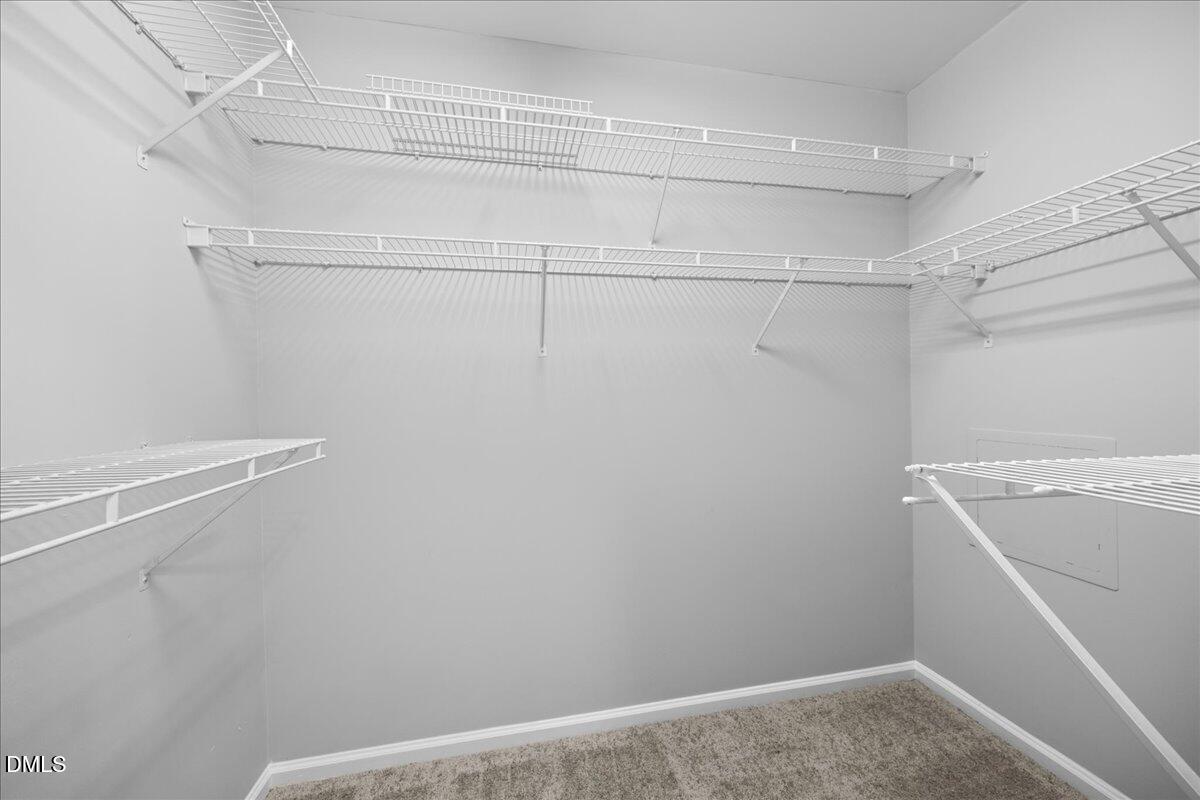 2708 Ferrand Drive Durham, NC 27705 - Photo 22 of 47 a view of a room with racks on the wall