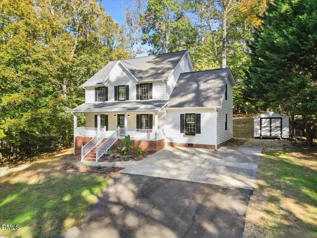 a picture of a bench in front of a window