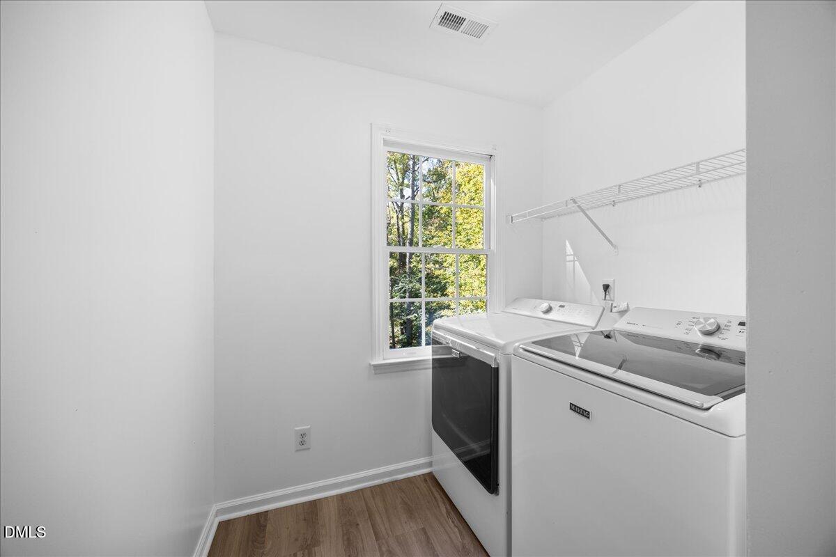 2708 Ferrand Drive Durham, NC 27705 - Photo 33 of 47 a utility room with dryer and washer