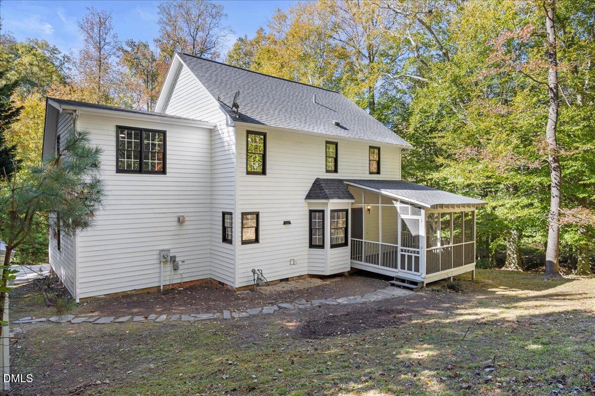 2708 Ferrand Drive Durham, NC 27705 - Photo 37 of 47 a view of a house with a yard