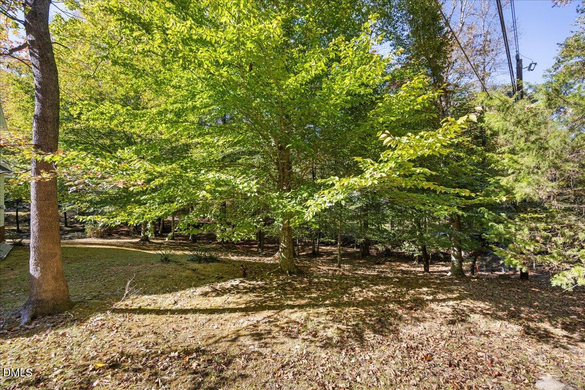 2708 Ferrand Drive Durham, NC 27705 - Photo 40 of 47 a view of a lake with an outdoor space
