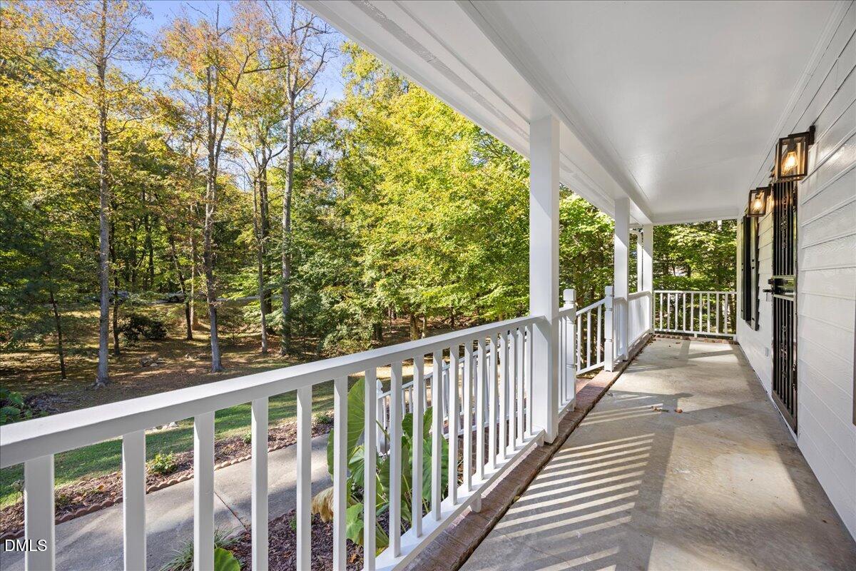 2708 Ferrand Drive Durham, NC 27705 - Photo 4 of 47 a view of balcony with trees