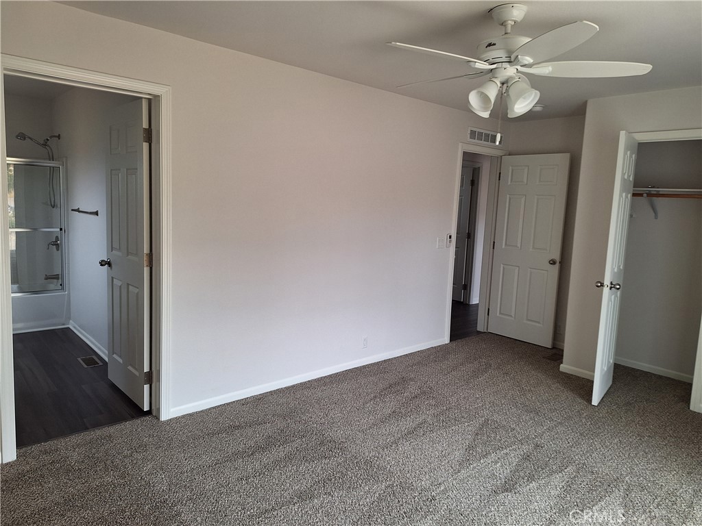 3708 Highway 140 Mariposa, CA 95338 - Photo 12 of 19 wooden floor in an empty room and a bathroom
