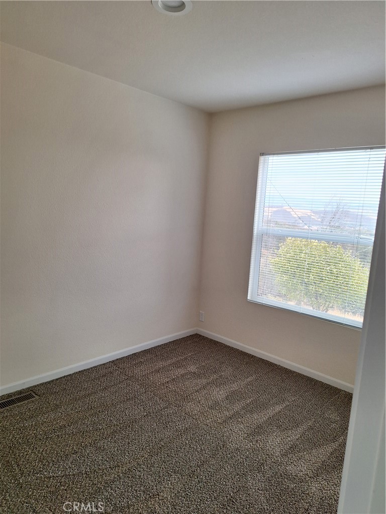 3708 Highway 140 Mariposa, CA 95338 - Photo 15 of 19 an empty room with a window